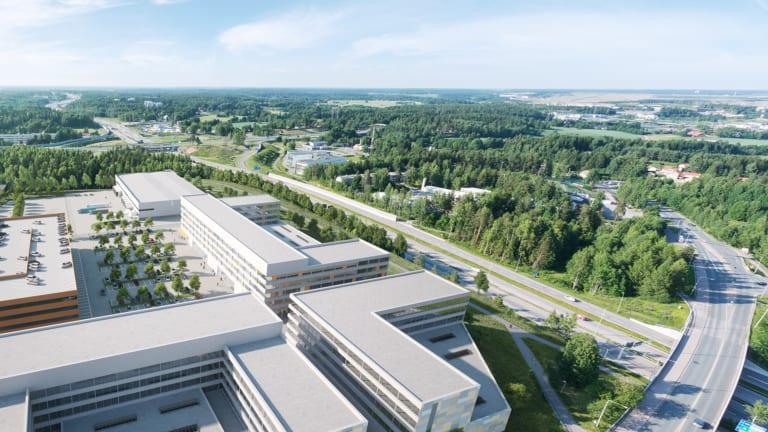 Pressi-rakennus, jossa on monta siipeä.