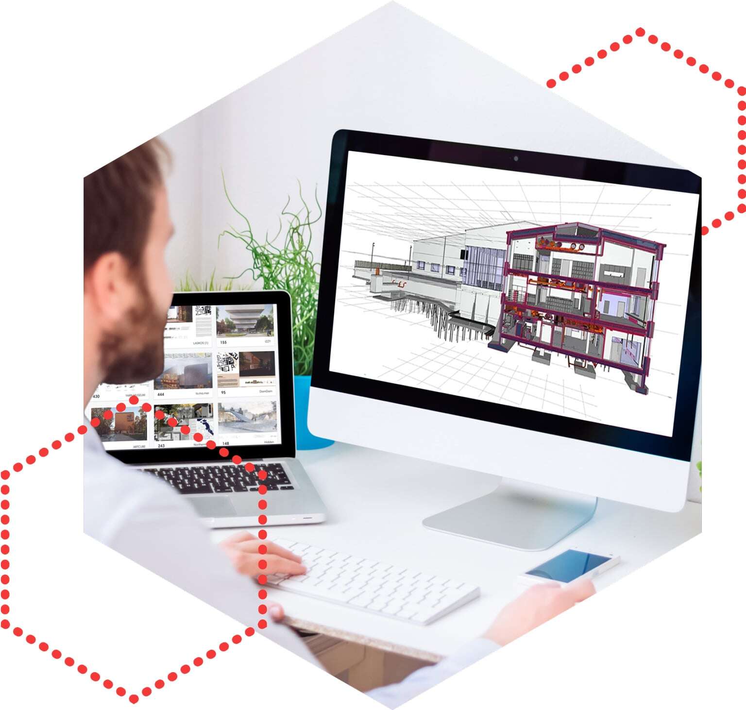 Mies työskentelee läppärillä.